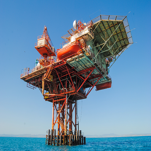 Oil rig platform in the ocean.